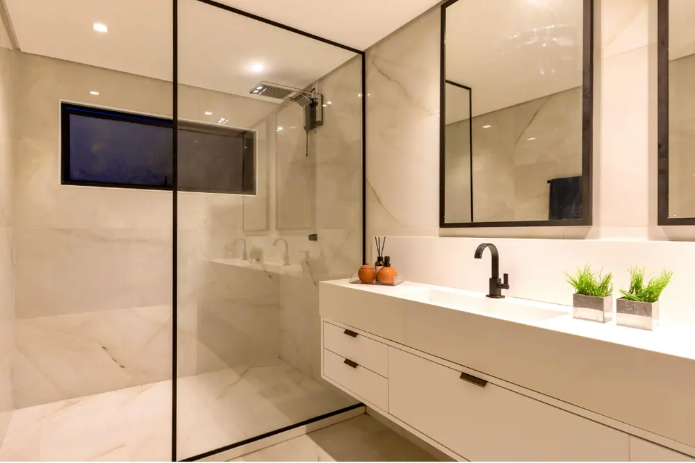 Spotless modern bathroom with glass shower